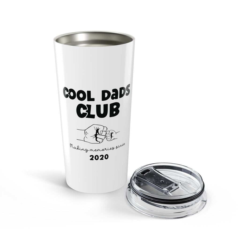 Personalized dad gift tumbler held outdoors natural light