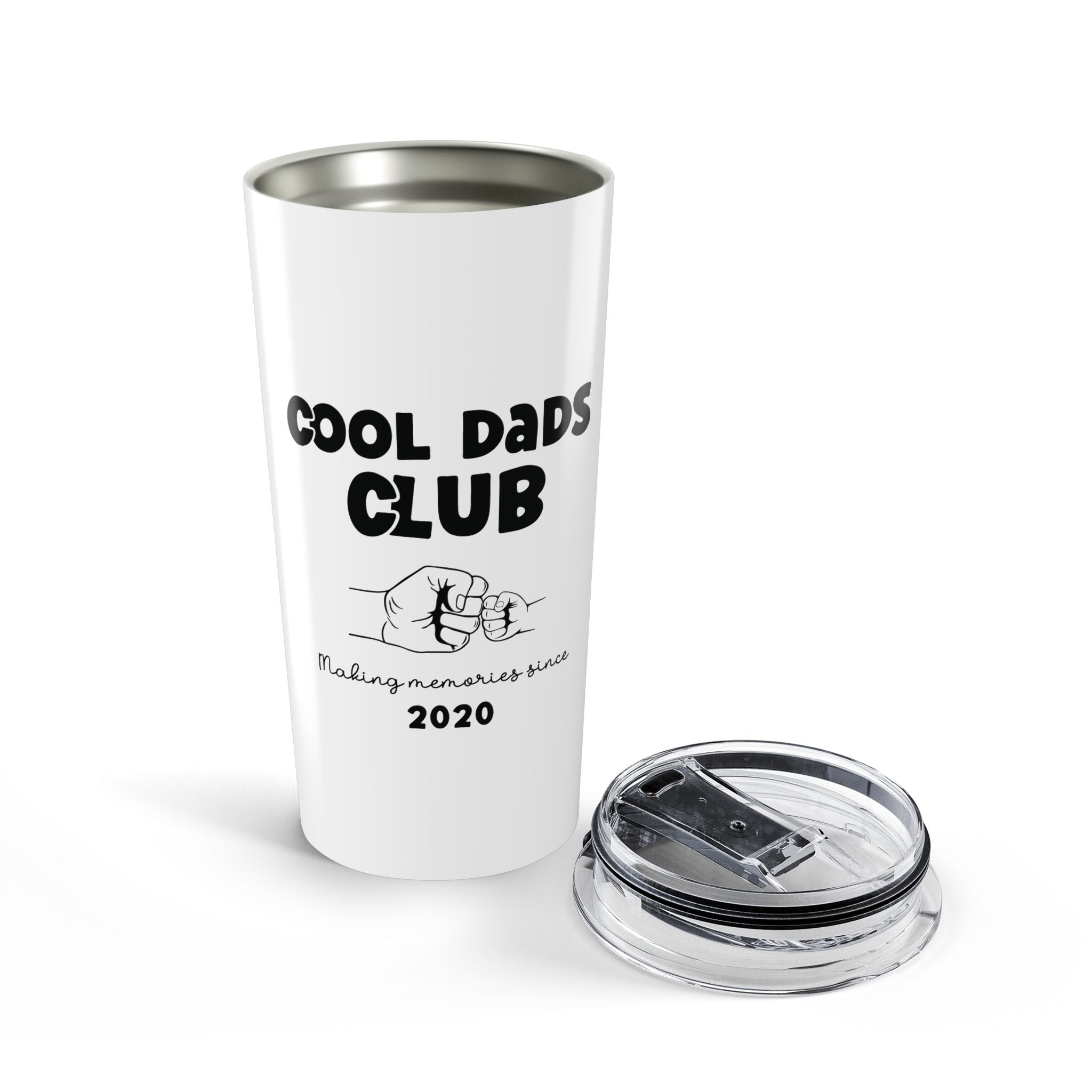 Personalized dad gift tumbler held outdoors natural light